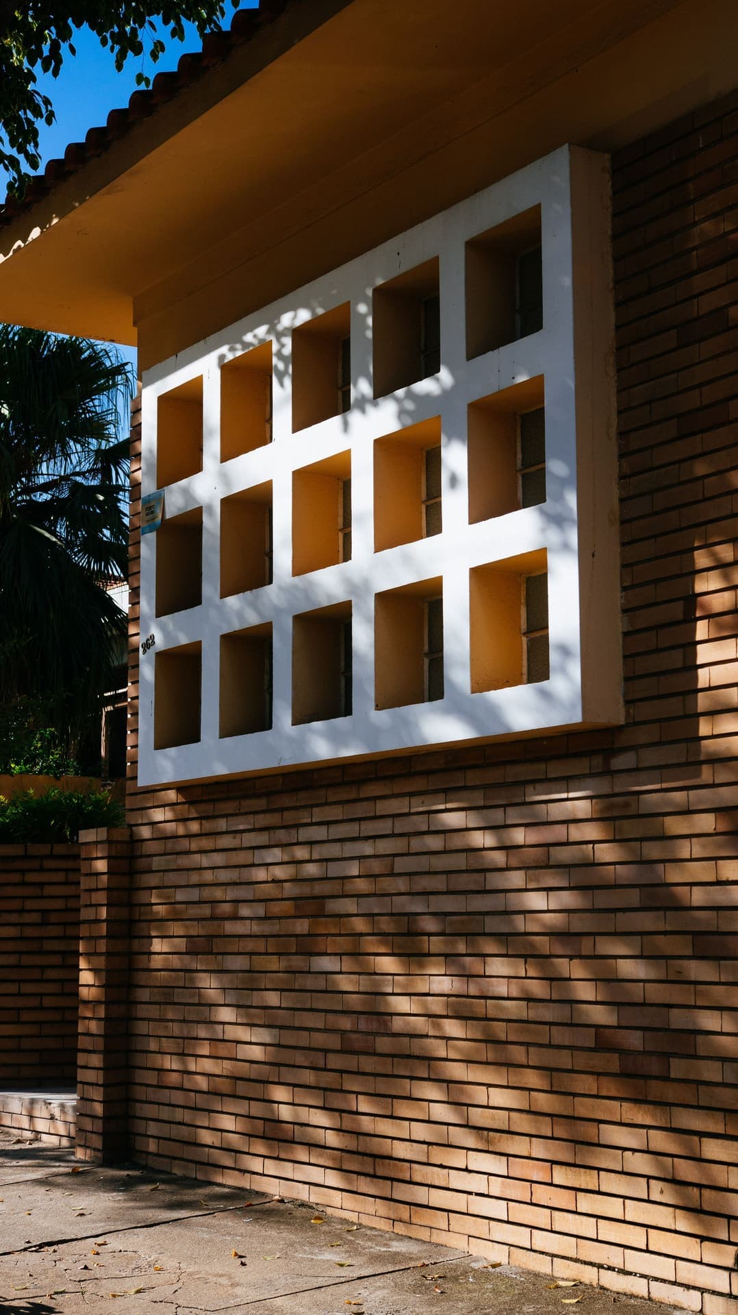Kiln House brick facade with its deep-set window
