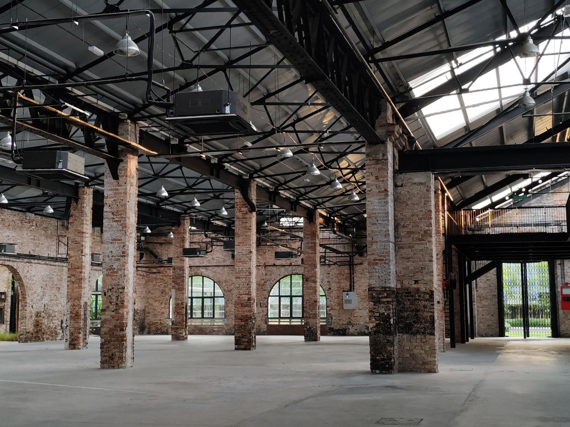 The dark shell of the warehouse